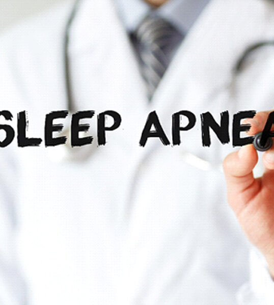doctor writing sleep apnea with a marker