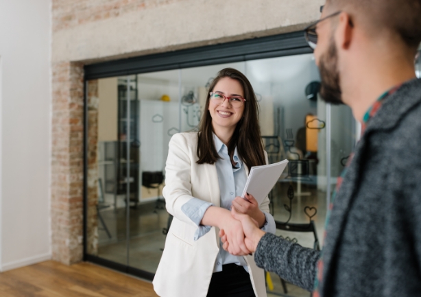 Man shaking hands with sleep center team member