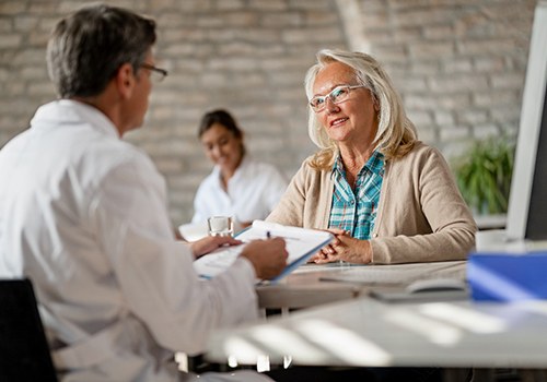 A woman discussing Medicare with her local medical professional