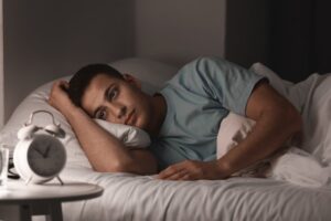 Man awake during middle of the night. 